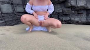 Girl Pissing on the Beach in Public