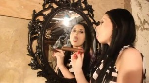 Brunette Smoking a Cigar in the Mirror