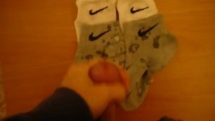 Jerk off and Cum over four Nike Socks